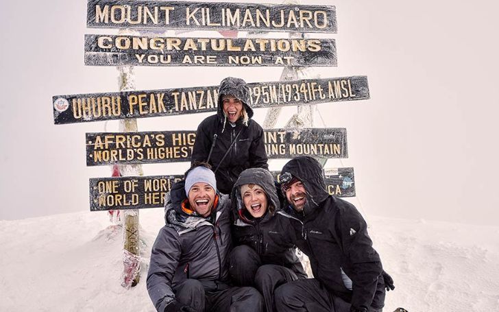 A picture of Mandy Moore with friends atop Kilimanjaro